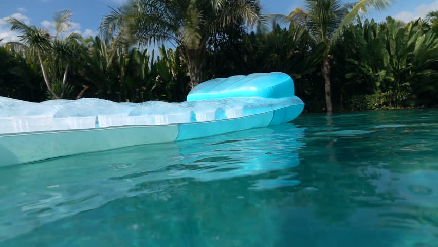 air mattress in a pool