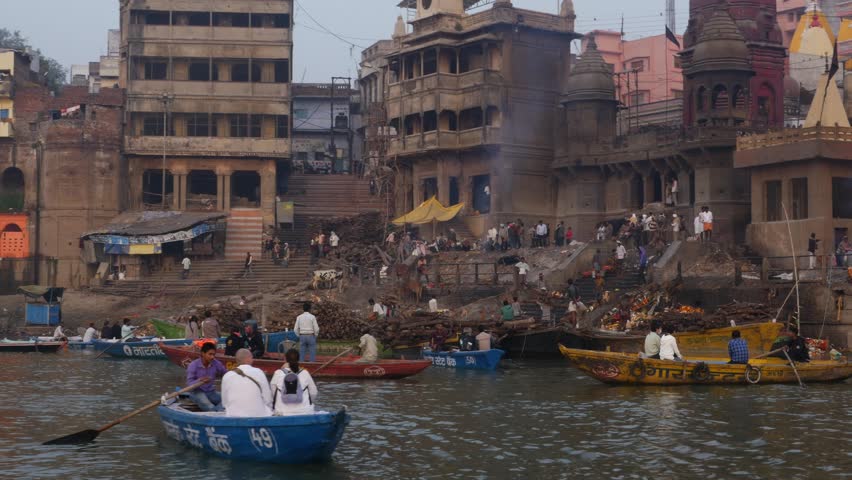 The Manikarnika Ghat Also Known As The Burning Ghat On The Banks Of The Ganges River In