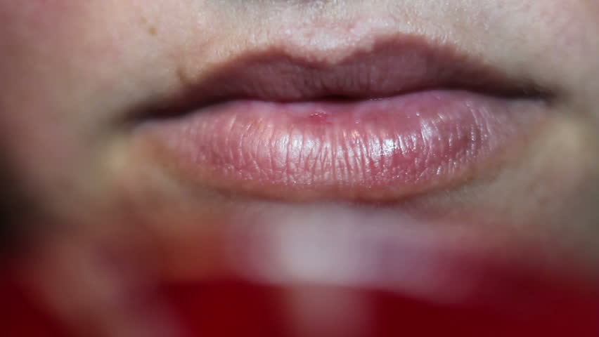 Close Up Of Young Woman Licking And Kissing Lips Stock Footage Video