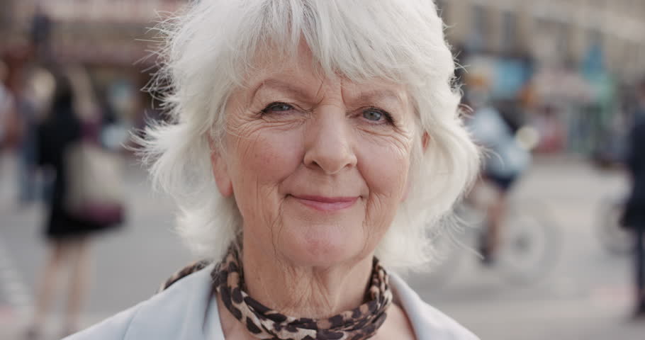 Slow Motion Portrait Of Happy Mature Old Woman Smiling In City Real