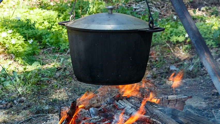 Traditional Cooking - Metal Pot Heated On Burning Firewood At Open Fire ...