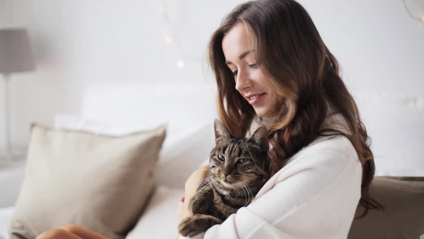 Beautiful Woman And Kitten At Home. Pet Cat And Young Owner Relaxing ...