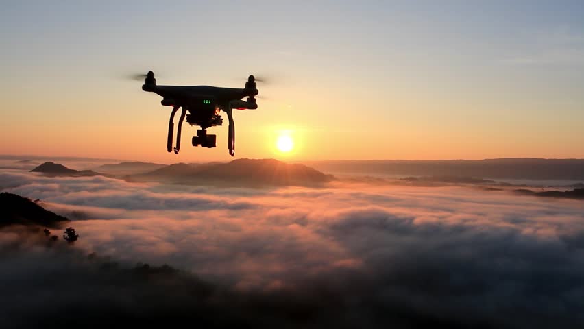 Drone Flying Over Cloud In Morning, In A Aerial Shot ...