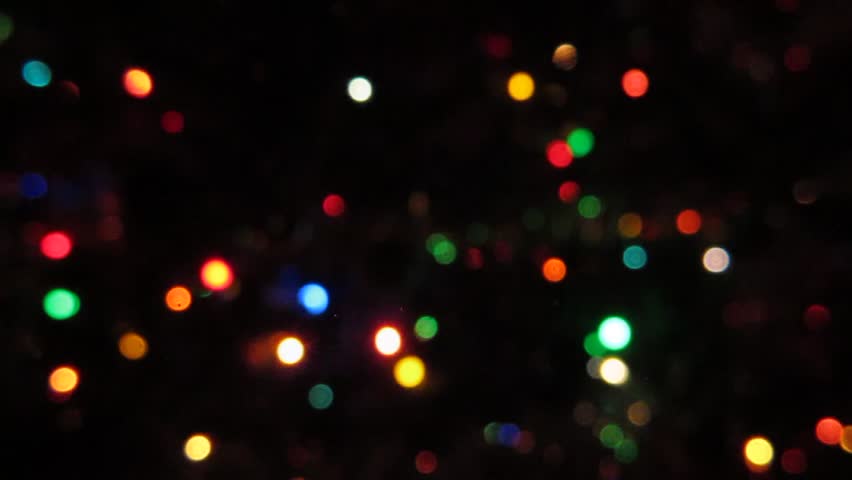 blurred colorful christmas lights on black background with blurred colorful christmas lights on black background with