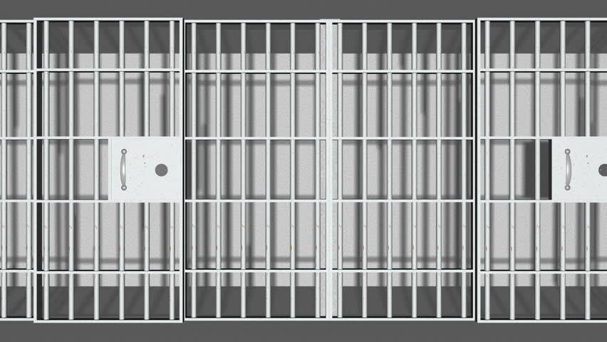 A Pan Of 3 Closed Dark Jail Cells Bars With The Doors Closing Stock ...