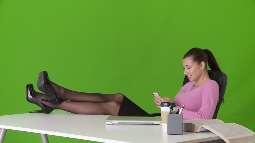 Young Business Woman Relaxing With Feet Up On Desk Stock Footage Video