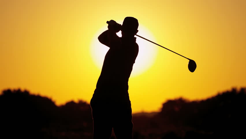 Male Caucasian Golfer In Sunset Silhouette Enjoying Vacation Luxury ...