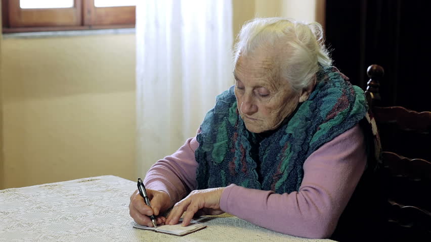 Very Old Lady Writing Something On Little Notepad: Aged, House, Inside ...