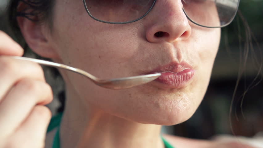 Young Girl In Bikini Eating Ice Cream Licking Her Lips Closeup Stock