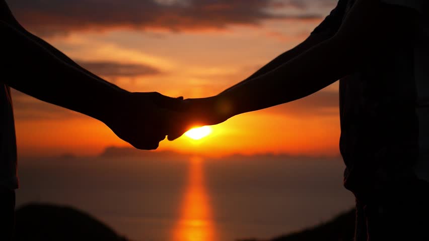 Kết quả hình ảnh cho holding hand sunset