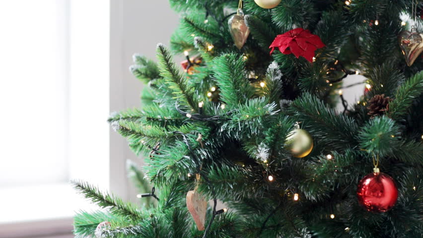 People Decorating For Christmas winter holidays, celebration and people concept - woman decorating People Decorating For Christmas winter holidays, celebration and people concept - woman decorating